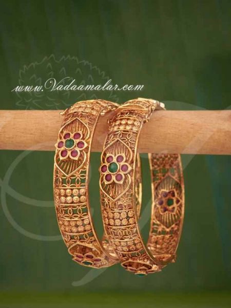Antique bangles Flower design bracelet gold toned buy now - 2 pieces