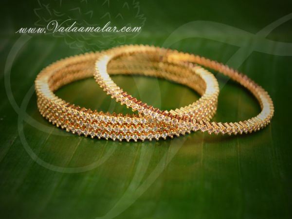 Micro gold plated bangle with American Diamond stones  Size  2-8 (4 Pices)