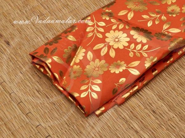 Gold flower print synthetic fabric for decorations - Orange Buy Online