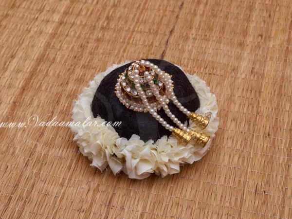 Andal Kondai Side Braid Knot Bun with Kemp Jewellery and White Flower Bharatanatyam Accessories.