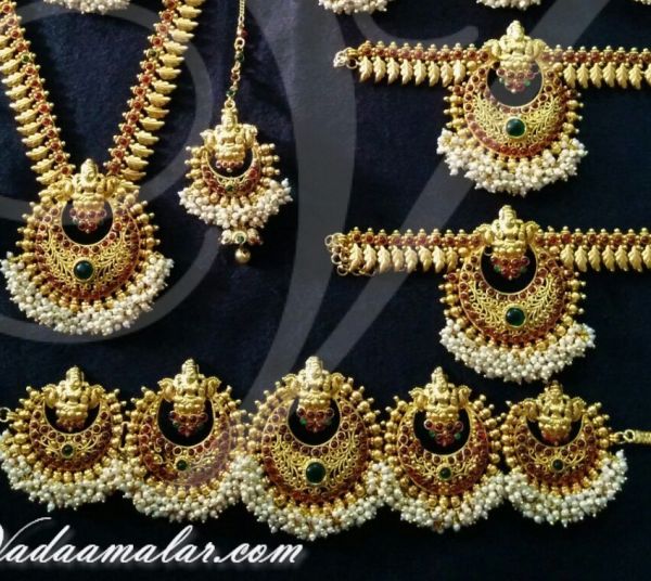 Antique Lakshmi Design Maroon and Green Color Stones Jewellery Set 8 piece Ornaments for Bridal Saree