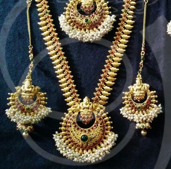 Antique Lakshmi Design Maroon and Green Color Stones Jewellery Set 8 piece Ornaments for Bridal Saree