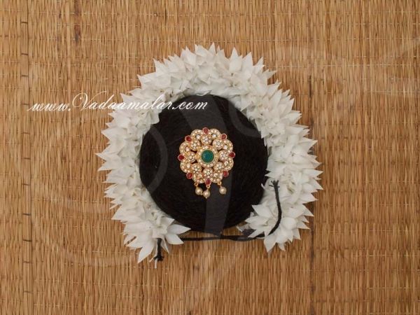 Indian Bridal Hair Design Band Bun with Multi ColorJewellery and White Flower Buy Now