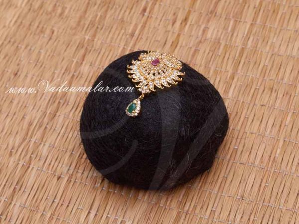 Indian Bridal Hair Design Band Bun with American Diamond,Ruby and Emerald Jewellery and White Flower Buy Now